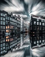 Amsterdam canal houses reflection dramatic sky