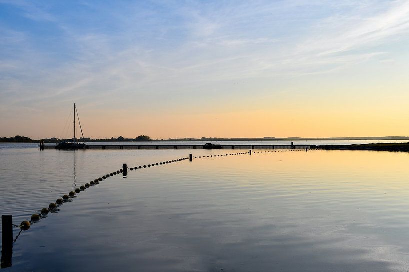 Sunset behind the jetty at the Veerse Meer by Veelzijdig Zeeland