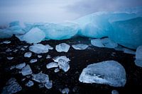 Icebergs on black beach