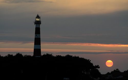 Ameland/Vuurtoren bij zonsondergang