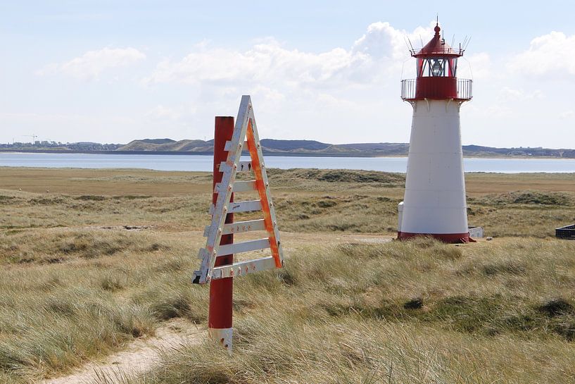 Phare et balise dans le coude sur l'île de Sylt par Martin Flechsig