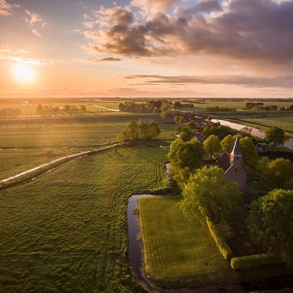 Church and sunrise von Hans Langenberg