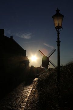 Coucher de soleil sur le moulin sur Henk Egbertzen