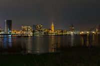 Skyline of Roermond at night during flood of the river Maas