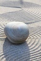 Stone on lines in the sand