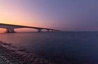 De Zeelandbrug tijdens een prachtige zonsondergang van Fabrizio Micciche thumbnail