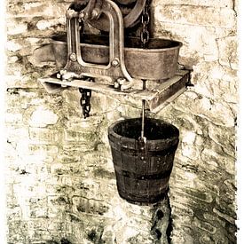 Bucket in well by Tammo Strijker