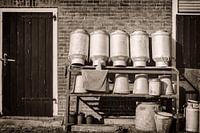 Milk cans in a row