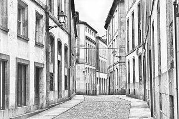Black and white image of an empty street in Santiago de Compostela on the pilgrimage route to the famous cathedral