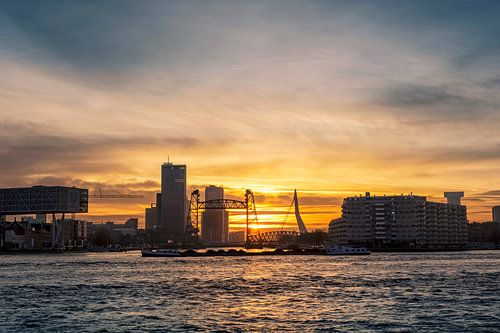 Old monumental railway bridge named De Hef and the Erasmus bridge in Rotterdam