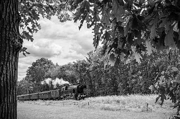 Steam train with smoke from the locomotive