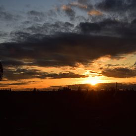 Zonsondergang van Rika Roozendaal