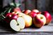 SF 11505579 Appels op rustieke, bruine achtergrond van BeeldigBeeld Food & Lifestyle