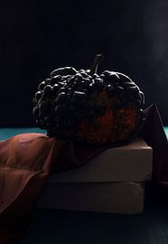 Pumpkin silhouette on black background by Olha Rohulya