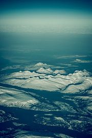 Aerial view over the snow covered mountains in Northern Norway by Sjoerd van der Wal Photography