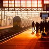 Coucher de soleil à la gare de Hollands Spoor à La Haye sur Rob Kints