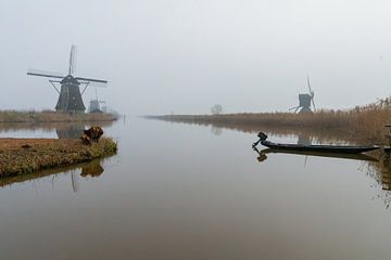 le moulin de kinderdijk dans le brouillard sur Merijn Loch