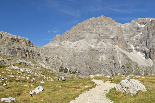 Panoramic view of the Dolomites against blue sky