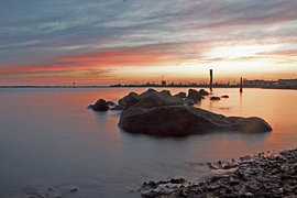 Sunset, rocks, Haringvliet, Hellevoetsluis by Heleen Sandee