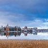 View across the Warnow to the Hanseatic City of Rostock in winter by Rico Ködder
