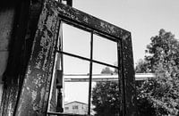 Doors and the decay in the hallway marked by time