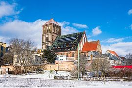 View of the Nikolai Church in winter in the Hanseatic City of Rostock by Rico Ködder