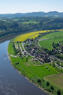 Aerial view of the rural village of Rathen in the Elbe Sandstone Mountains in eastern Germany with the river Elbe vertical by Animaflora PicsStock