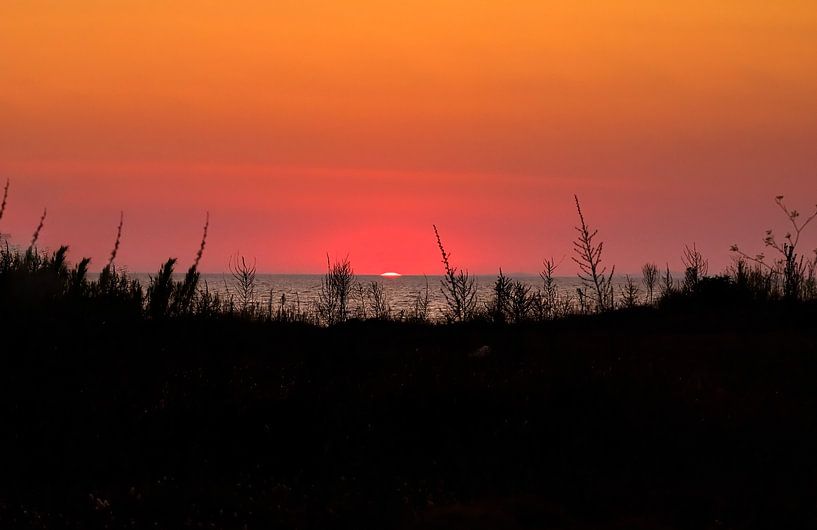 The coast of greece with sunset and sea view by foto by rob spruit
