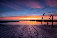 Zonsopkomst boven meer