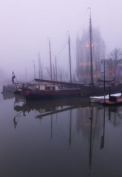 Old harbour in the fog by Ilya Korzelius