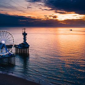 The pier of Scheveningen in the light of the sunset by Arthur Scheltes