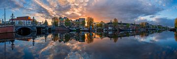 View of the Amstel River (east side) and the Walter Süskind Bridge in Am by Amsterdam.Photos