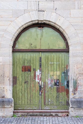 Green weathered door in many colours by Hilda Weges