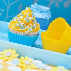 mise en place de cupcakes bleu-jaune sur Patricia Verbruggen