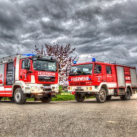 Deux générations de camions de pompiers sur Hermann Kollinger