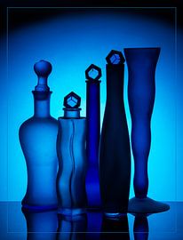 five blue bottles or vases against a blue background. by Gerhard de Wit