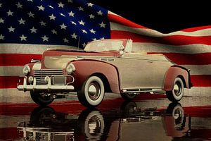 Chrysler New Yorker Highlander 1940 mit amerikanischer Flagge von Jan Keteleer