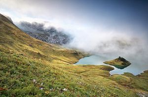 misty morning on alpine lake Schrecksee