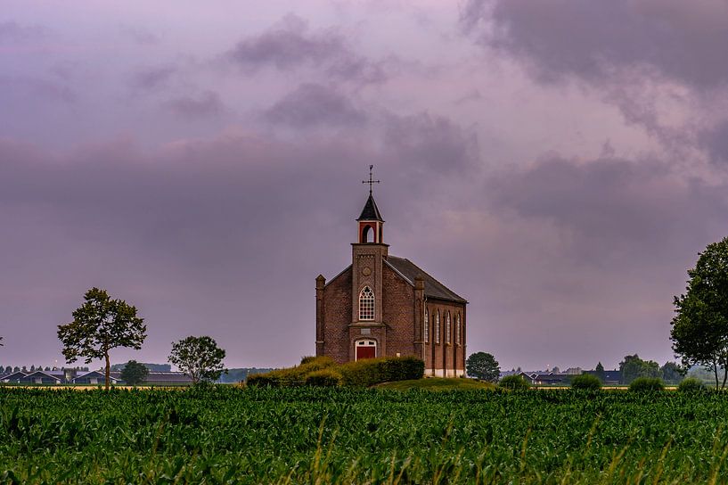 threatening sky over the church by Tania Perneel