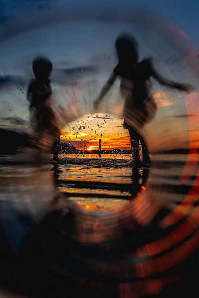 sunset thru a bottle by Jeffrey van Roon