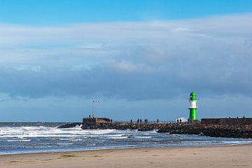 Beach and pier on the Baltic coast in Warnemünde by Rico Ködder