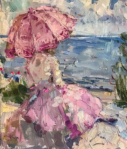 vrouw met hoed aan het strand