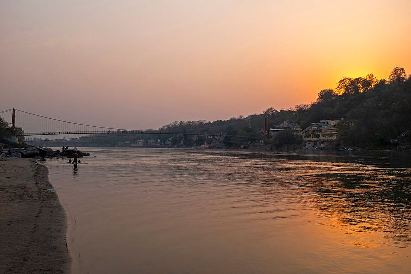 The holy river Ganges near Laxmanjhula in India Asia with sunset by Eye on You