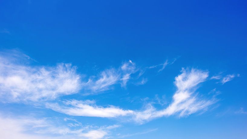 Blue sky with clouds by Günter Albers