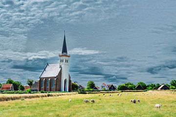 Texel Den Hoorn with the little church and a dark sky