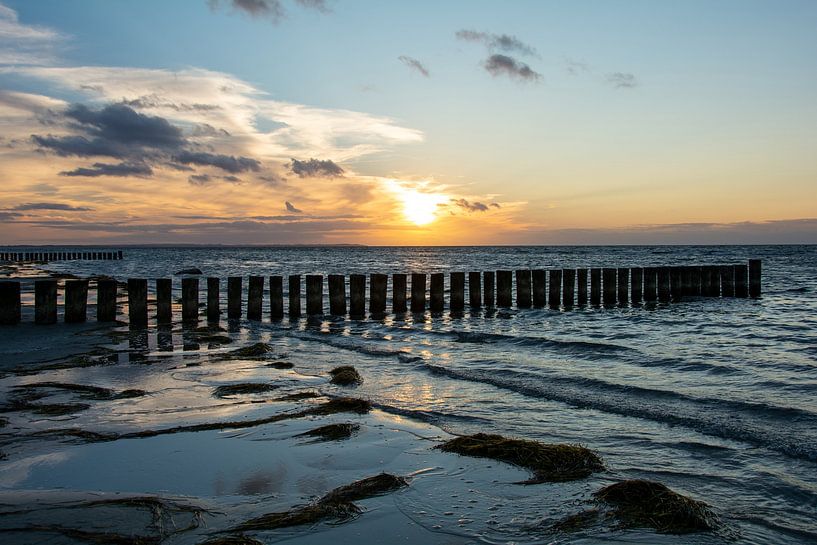 Breakwater at sunset by Claudia Evans