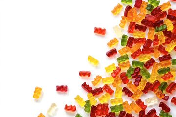 corner background made of colorful fruit gum candies isolated with small shadow on white, generous c by Maren Winter