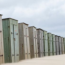 Row of small wooden beach houses in juliana village North-Holland. by Marjolein Hameleers