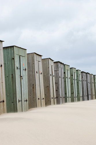 Row of small wooden beach houses in juliana village North-Holland.