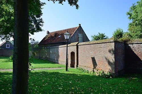 De boog door de muur